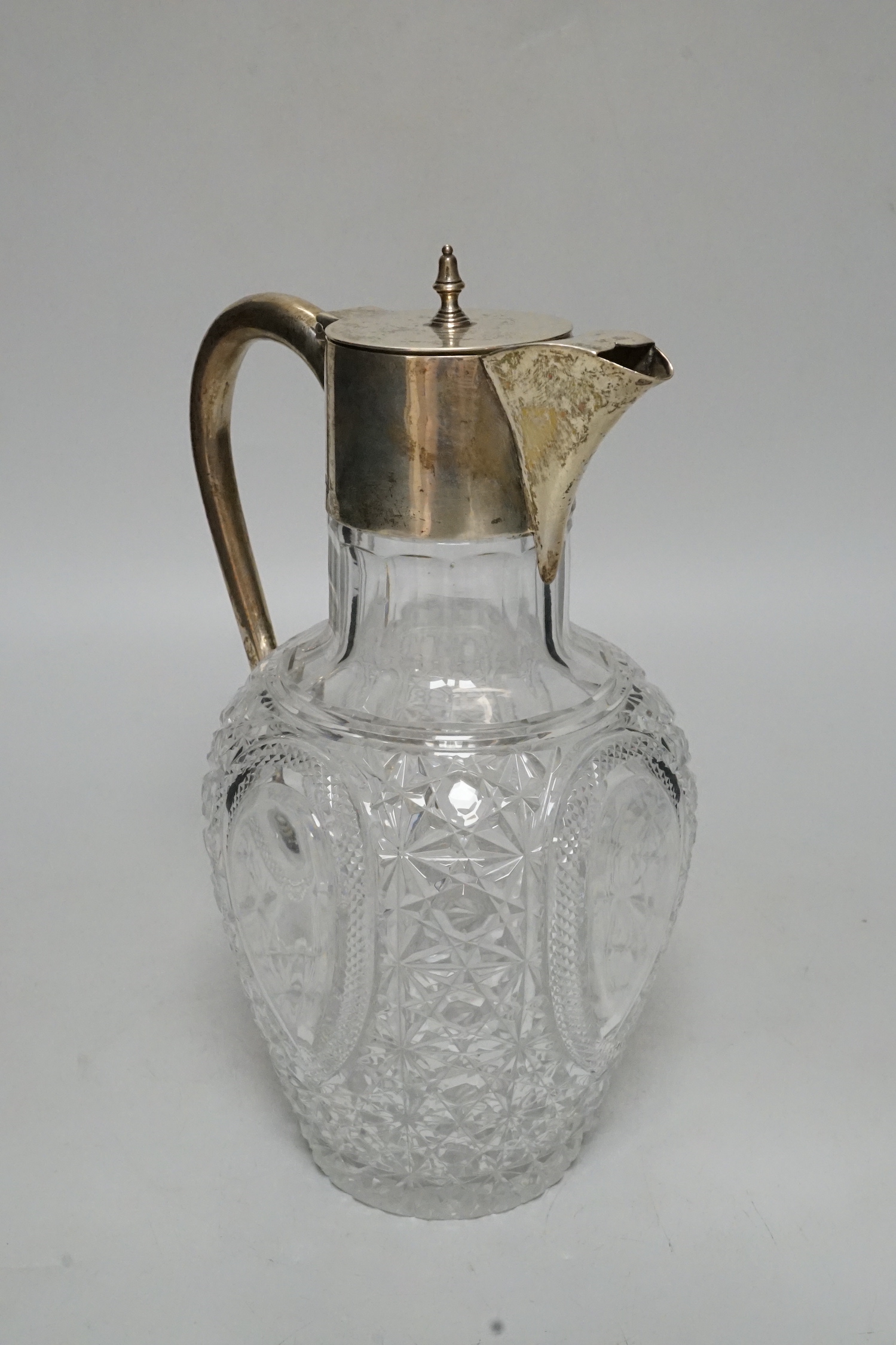 An Edwardian silver mounted cut glass claret jug, G. Loveridge & Co, Birmingham, 1904, 23cm